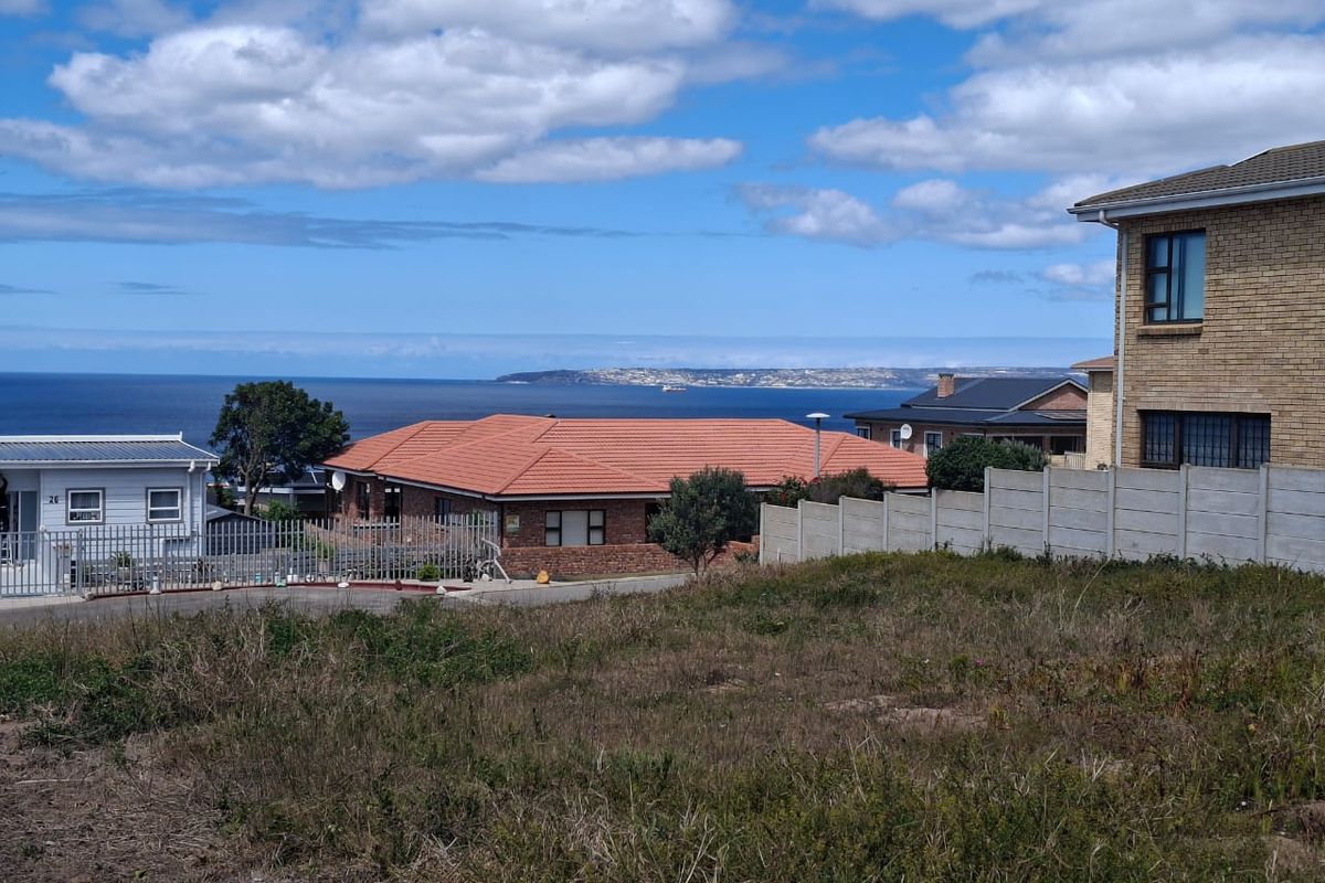 A view of the ocean and coastal landscape from the vacant residential property.
