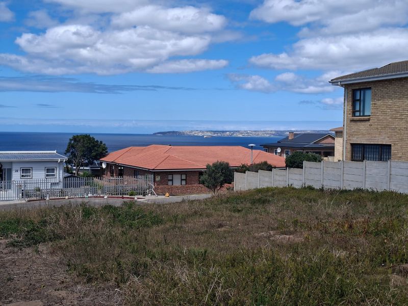 A view of the ocean and coastal landscape from the vacant residential property.