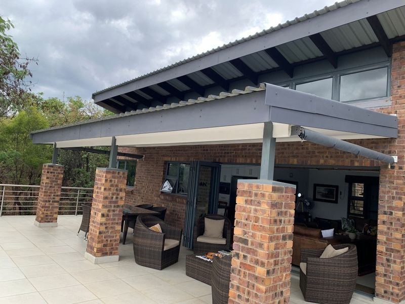 Architectural Masterpiece with Breathtaking Bushveld Views - Photo 10