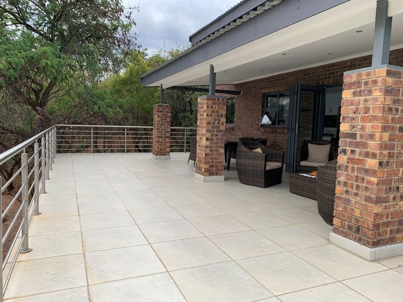 Architectural Masterpiece with Breathtaking Bushveld Views - Photo 9