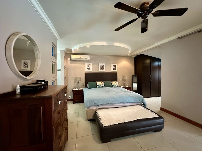 Luxury 5-Bedroom Home Offering Sophisticated Living, Seamless Design, and Premier Indoor–Outdoor Ele - Photo 10