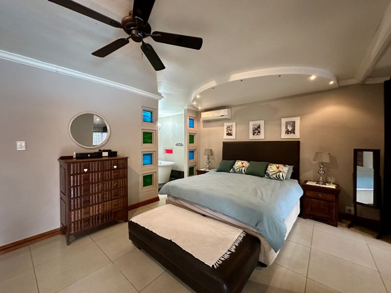 Luxury 5-Bedroom Home Offering Sophisticated Living, Seamless Design, and Premier Indoor–Outdoor Ele - Photo 4