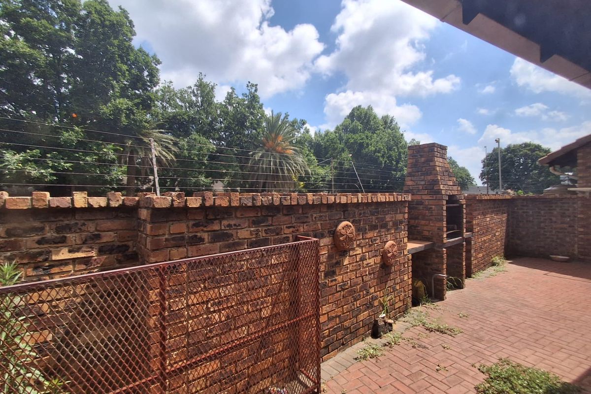 Situated in this peaceful and well kept complex in Arcon Park is this Face brick Townhouse. - Photo 5