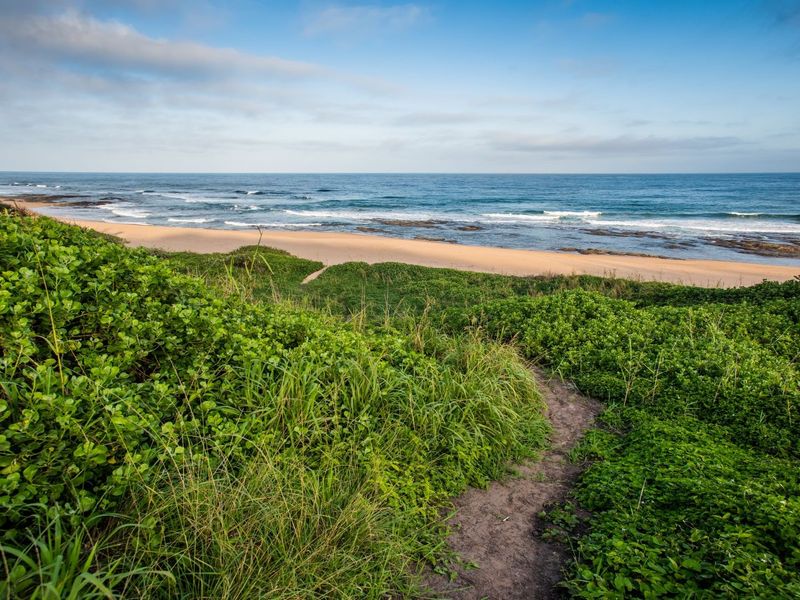 Prime Hillside Stand with Panoramic Sea Views in Precinct A Seaton Estate - Photo 9