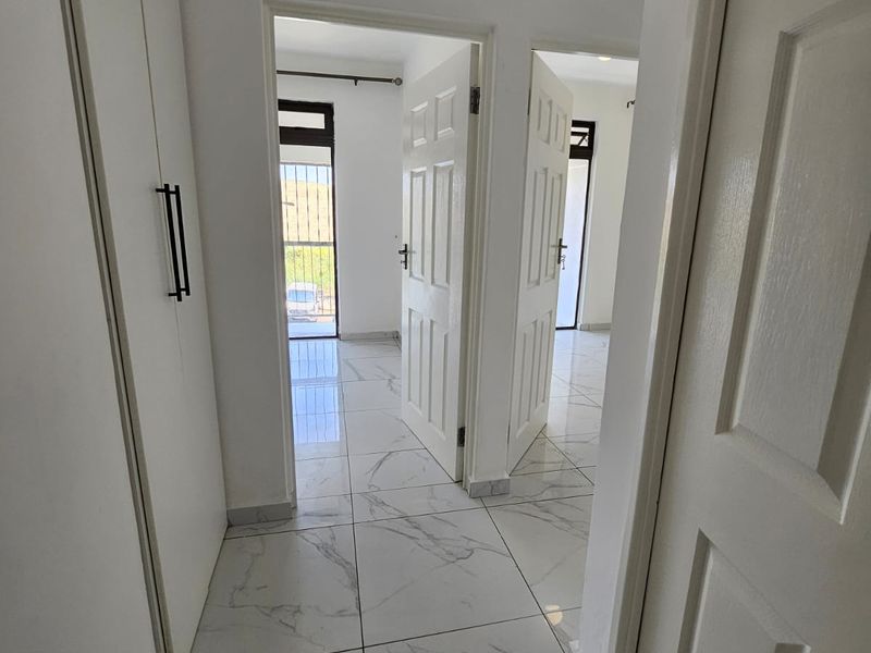 Sea Views, Private Garden & Beachside Living in Tinley Manor - Photo 3