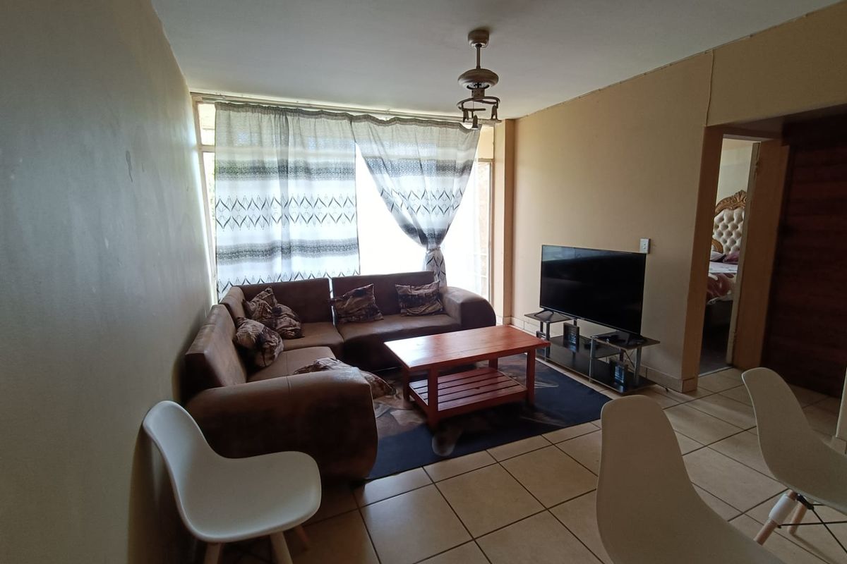 Secure 2-Bed Apartment | Prime Location. - Photo 2