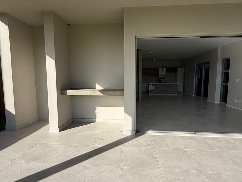 Modern Four-Bedroom Home in Exclusive Palm Lakes Development - Photo 7