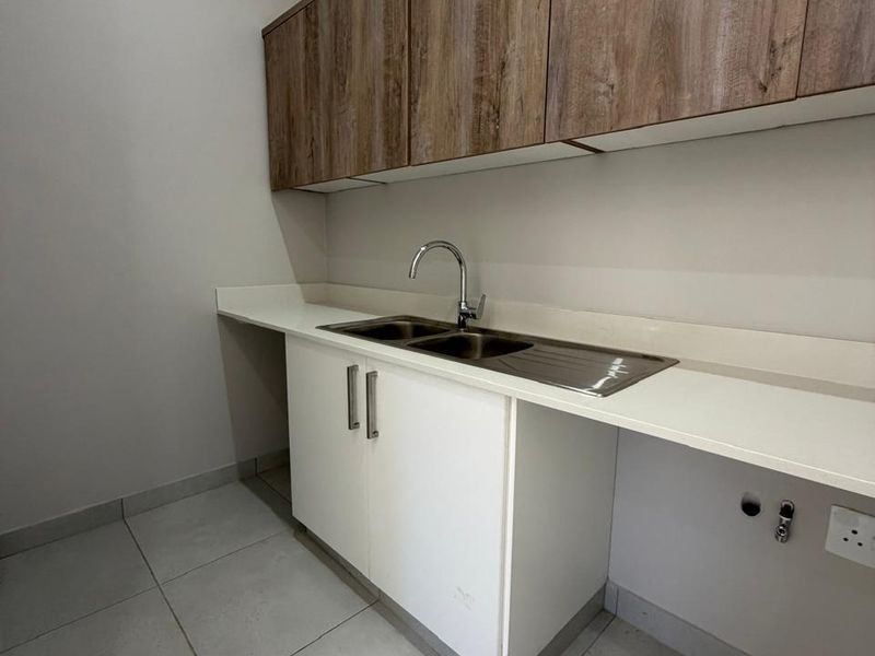 Modern Four-Bedroom Home in Exclusive Palm Lakes Development - Photo 6