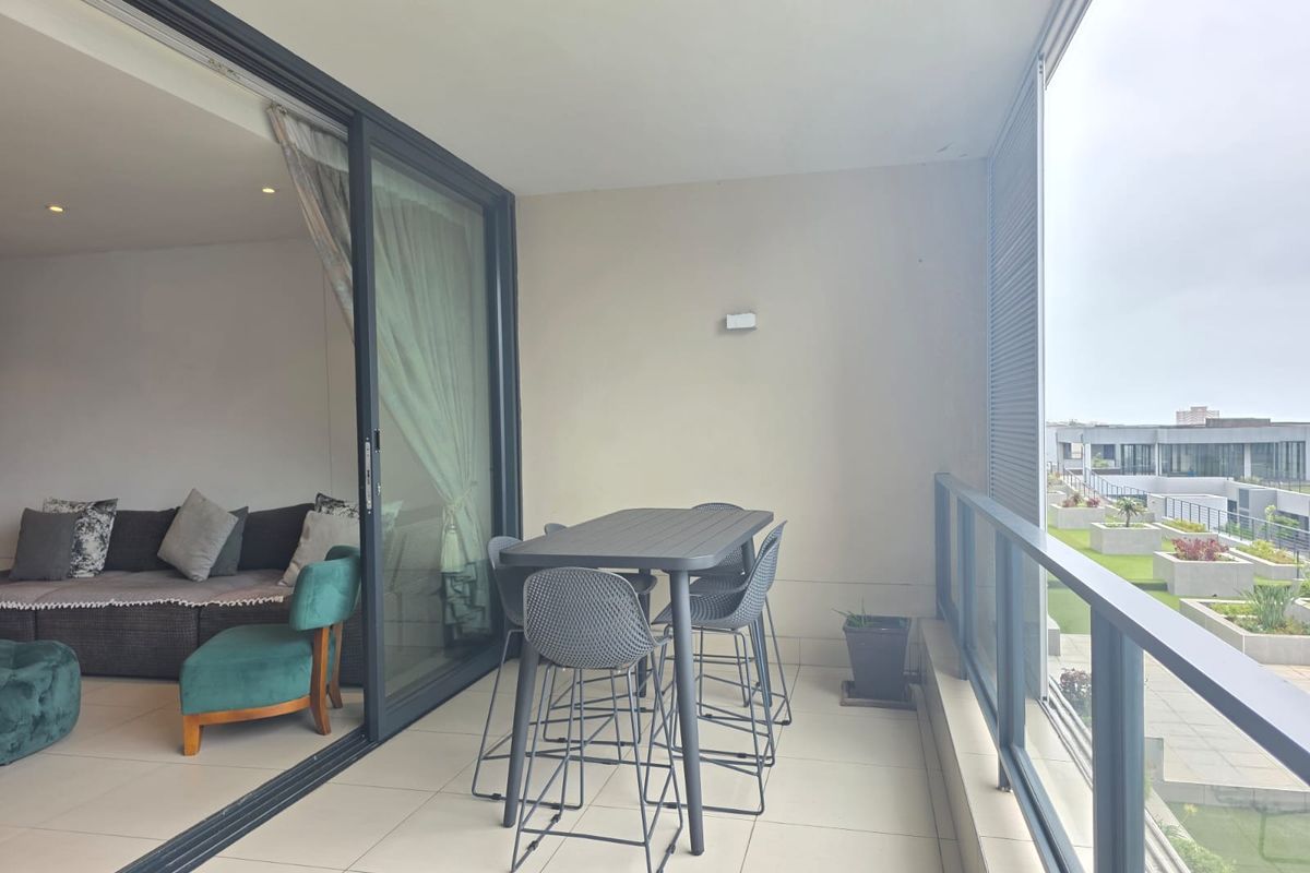 Stylish 3-Bedroom Umhlanga Apartment with Distant Sea Views & Walk-to-Beach Lifestyle - Photo 4