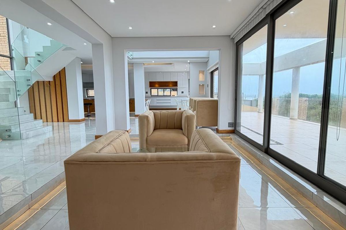 Exquisite Newly Renovated Coastal Residence with Breathtaking Panoramic Sea Views - Photo 2