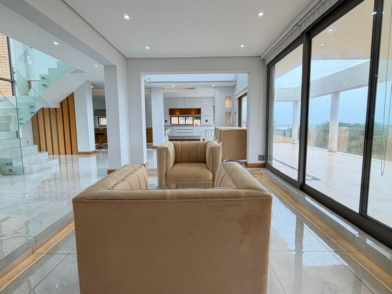 Exquisite Newly Renovated Coastal Residence with Breathtaking Panoramic Sea Views - Photo 2