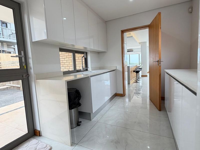 Exquisite Newly Renovated Coastal Residence with Breathtaking Panoramic Sea Views - Photo 8