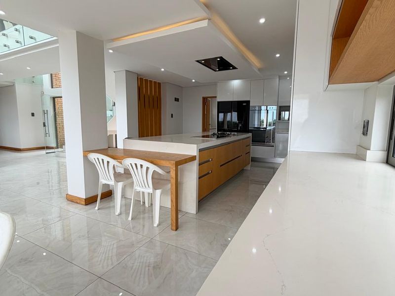 Exquisite Newly Renovated Coastal Residence with Breathtaking Panoramic Sea Views - Photo 7