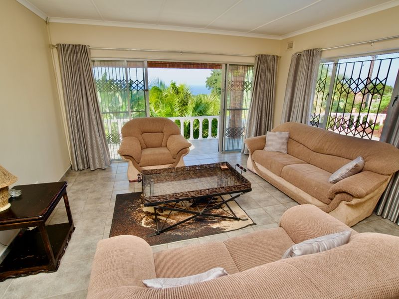 Elegant Coastal Retreat with Pool, Sea Views & Exceptional Entertaining Spaces - Photo 3