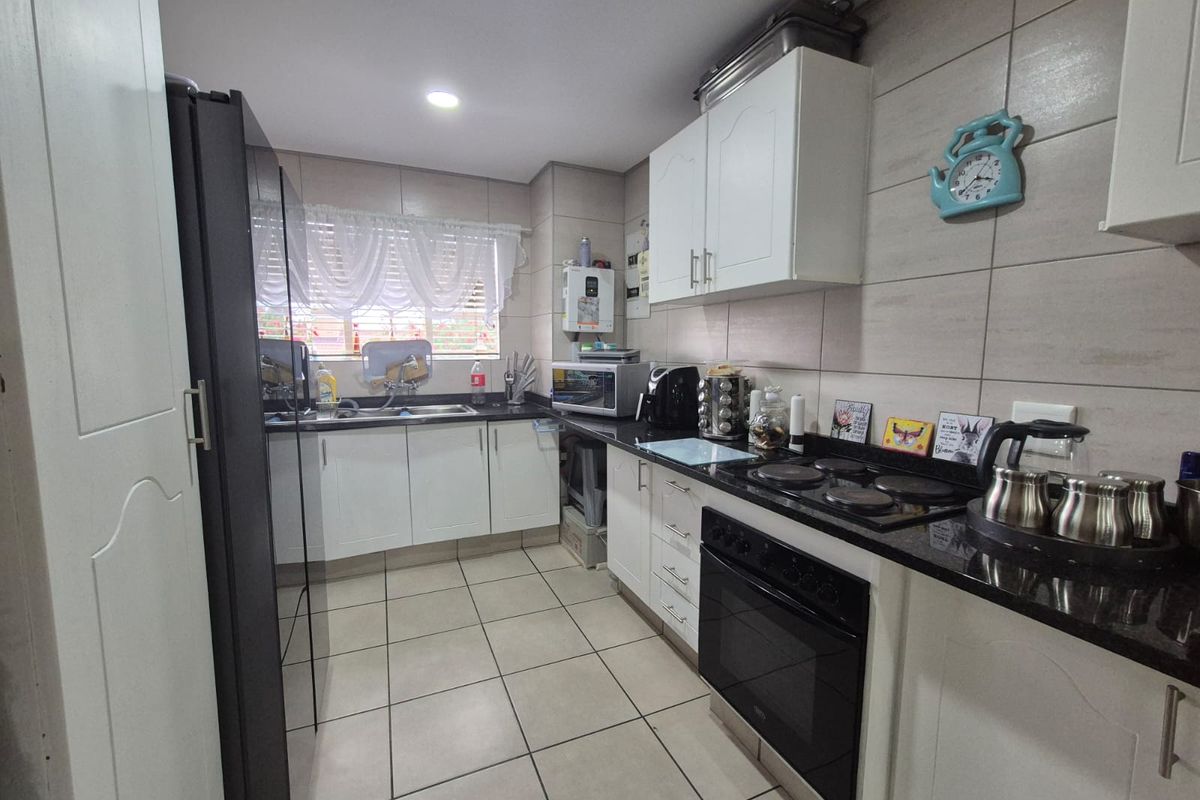 Modern Bliss in a Secured Complex! - Photo 2