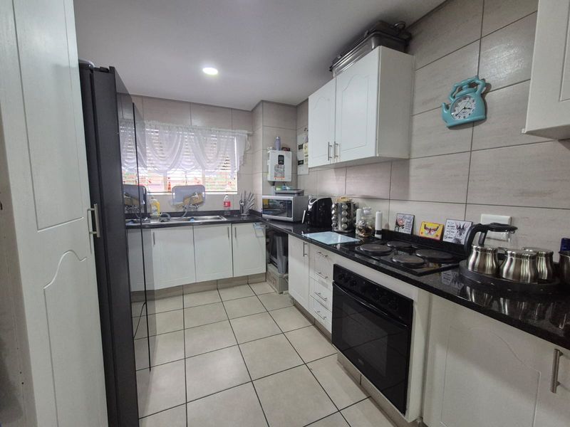 Modern Bliss in a Secured Complex! - Photo 2