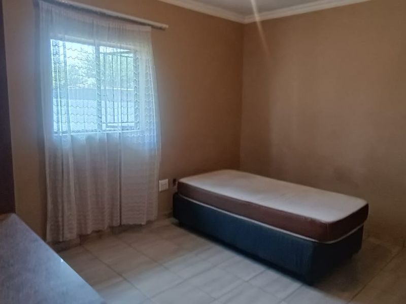 Prime Real Estate: 9-Bed Powerhouse with Solar Upgrades - Photo 10