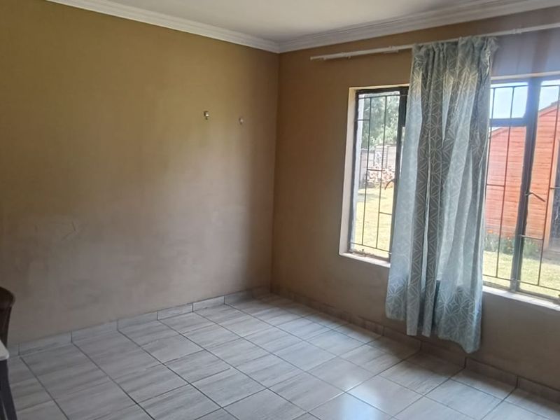 Prime Real Estate: 9-Bed Powerhouse with Solar Upgrades - Photo 4