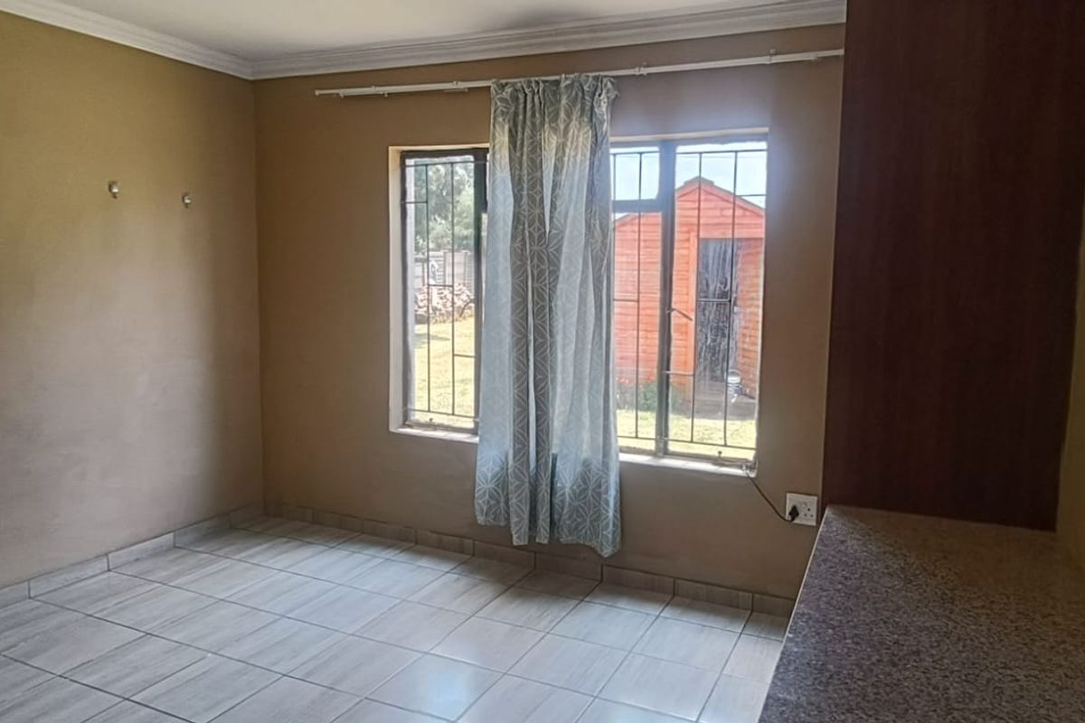 Prime Real Estate: 9-Bed Powerhouse with Solar Upgrades - Photo 3