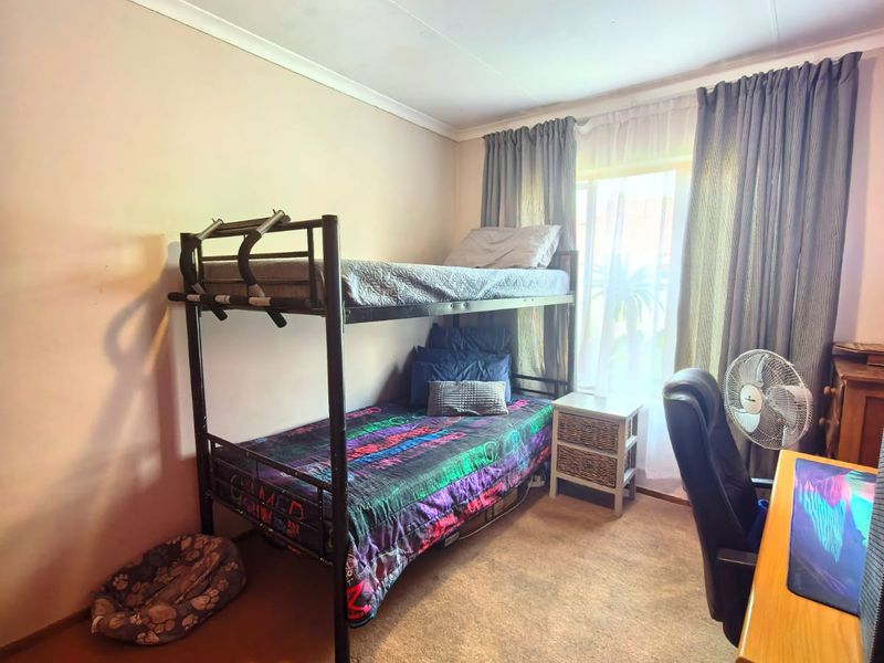 Well established townhouse for sale in Vaalpark in a popular complex, close to schools and shopping - Photo 9