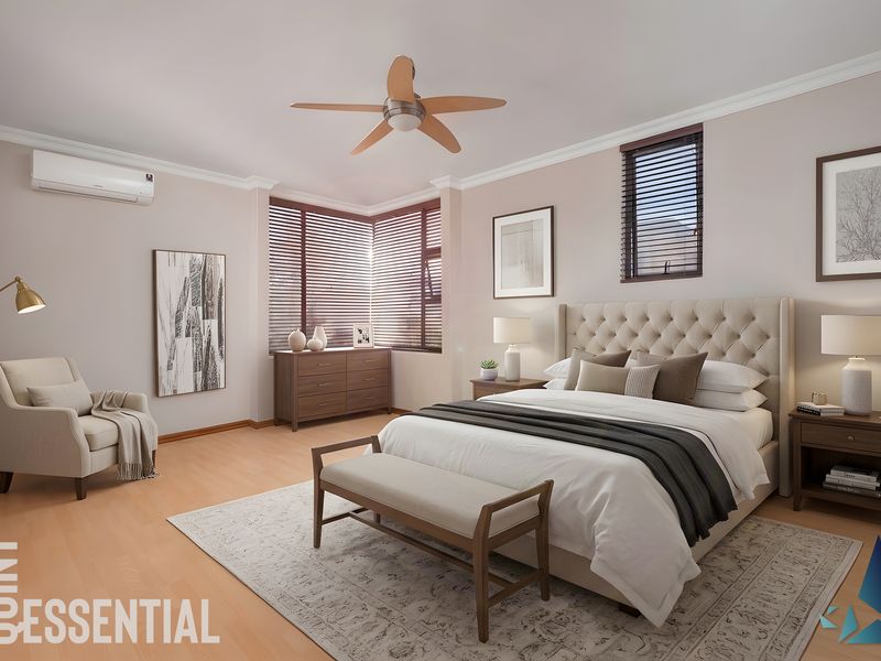 A well-appointed bedroom featuring a ceiling fan, split-system air conditioning, and large windows with venetian blinds, finished with light laminate flooring.