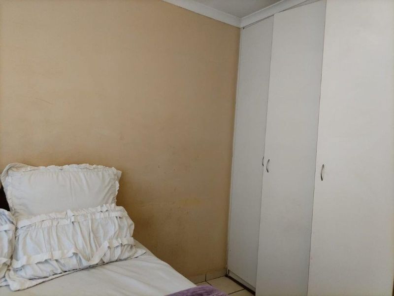 CHARMING FIXER-UPPER WITH GREAT POTENTIAL AT EAST END FOR SALE - Photo 10