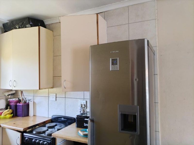 CHARMING FIXER-UPPER WITH GREAT POTENTIAL AT EAST END FOR SALE - Photo 7