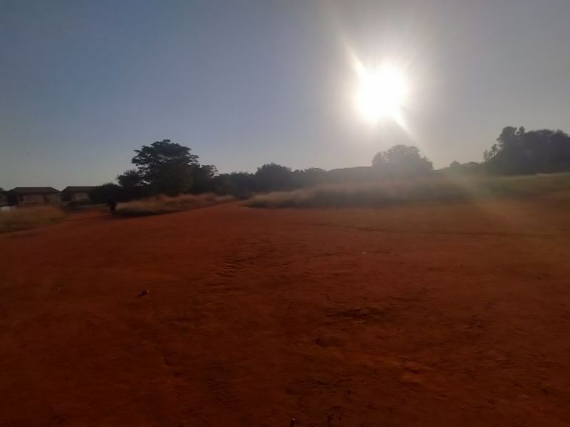 This expansive 60,000 square meter plot, situated opposite Akasia Primary School - Photo 10