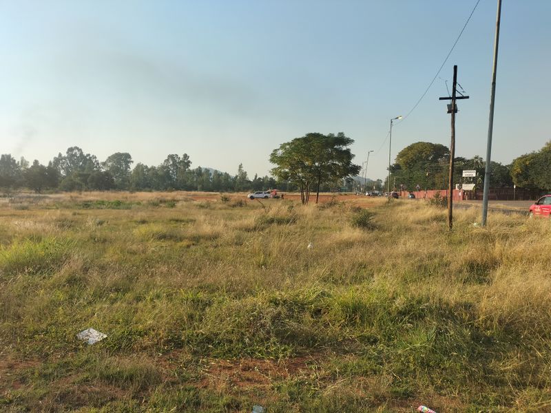 This expansive 60,000 square meter plot, situated opposite Akasia Primary School - Photo 6