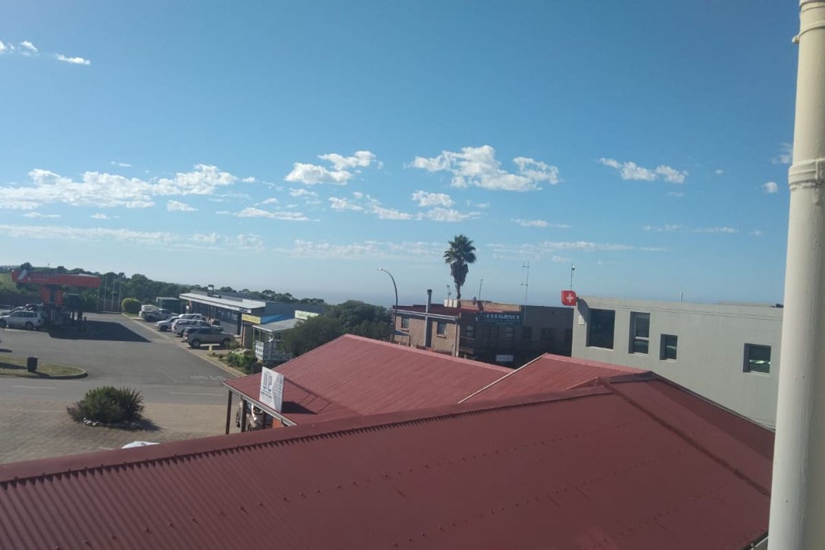 An elevated view overlooking the surrounding neighbourhood, rooftops, and local street infrastructure.