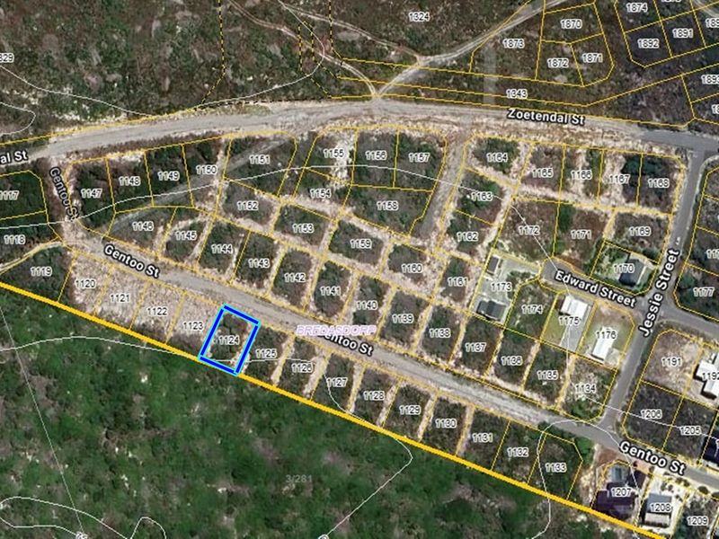 An aerial view of the residential area in Bredasdorp, highlighting the specific vacant land plot with cadastral boundaries clearly marked.
