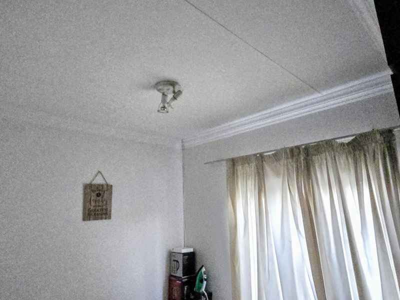 Charming 3-Bedroom House with Modern Amenities and Spacious Yard - Photo 8