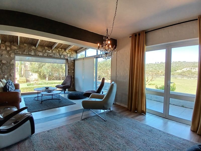 Idyllic Riverfront Residence Offering Privacy and Elegance - Photo 3