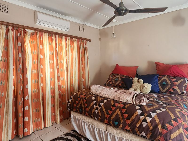 Spacious Three-Bedroom Home with Modern Entertainment Area - Photo 6