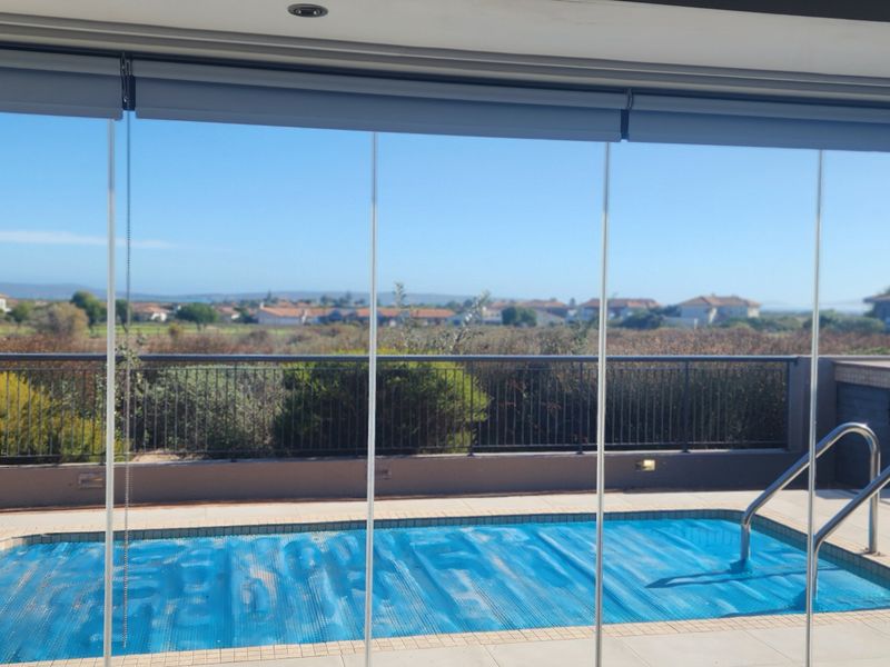Sophisticated Living with Lagoon, Fairway and Greenbelt Views in Langebaan Country Estate - Photo 3
