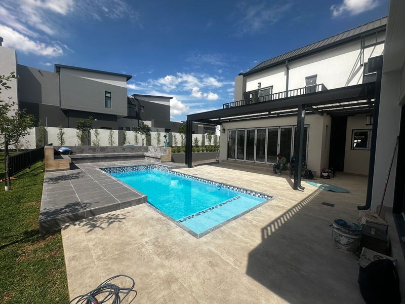 Exquisite Double-Storey Home in Midstream Heights with Pool, Boma and Cinema Room. - Photo 4