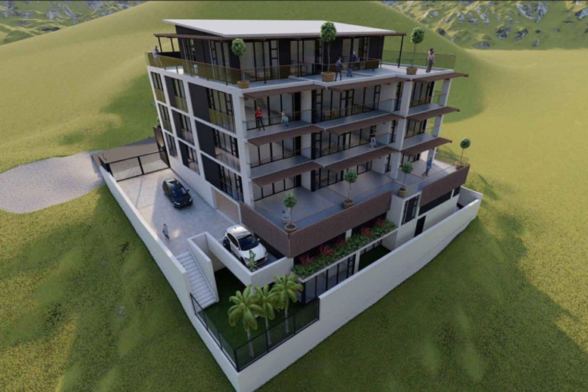 An aerial perspective of a modern multi-level apartment complex featuring tiered balconies, glass railings, and integrated parking facilities.