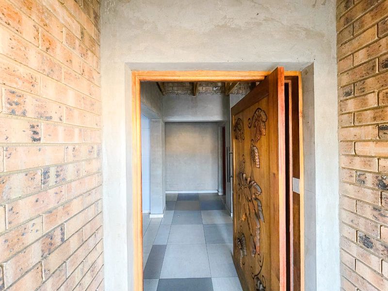 Spacious 4-Bedroom Home with Additional Outside Rooms for Versatile Living - Photo 9