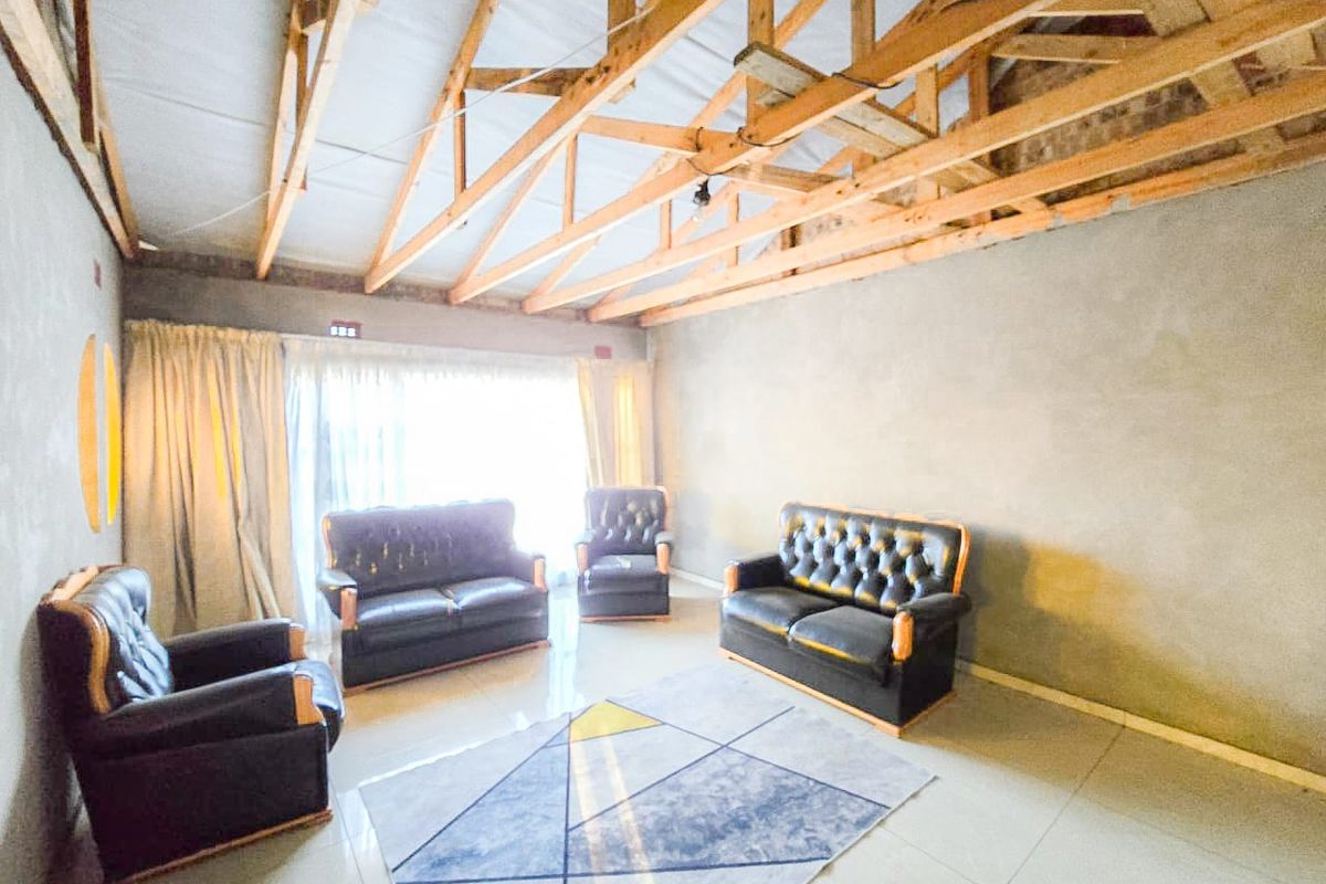 Spacious 4-Bedroom Home with Additional Outside Rooms for Versatile Living - Photo 4