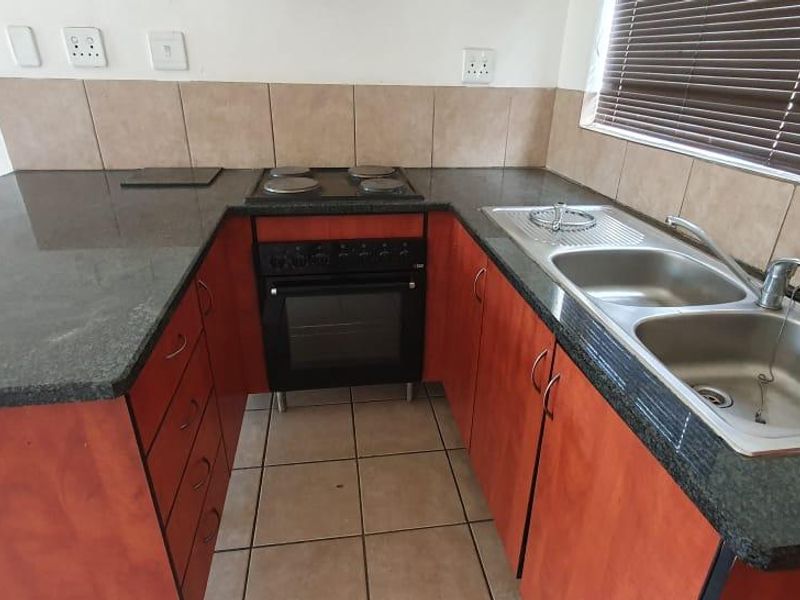 A HOME IN A SECURED COMPLEX 3 BEDROOM HOUSE - Photo 3