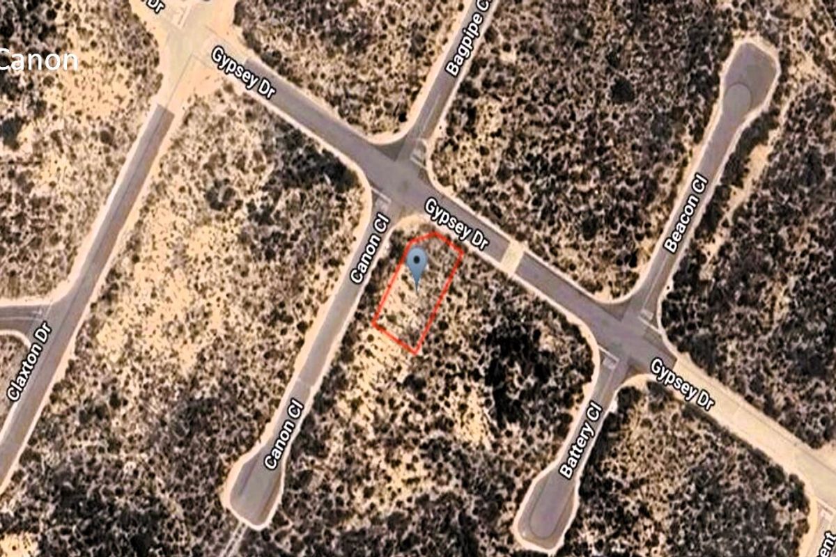 Aerial view of a vacant residential plot located at the corner of Gypsey Drive and Canon Close.