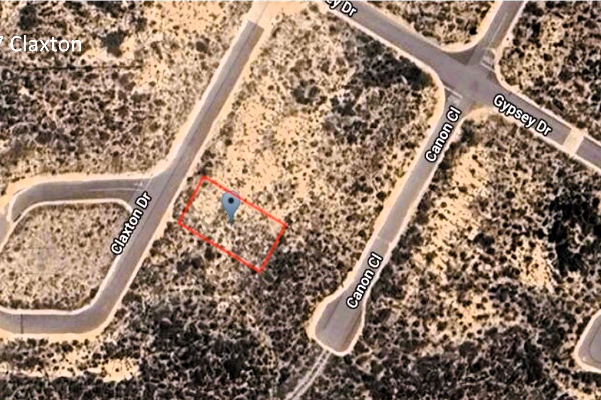 Aerial view of a vacant residential plot located at the corner of Claxton Drive and Canon Close.