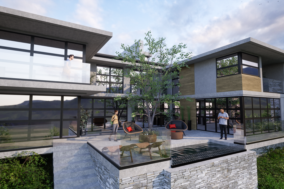 Modern multi-level residential exterior featuring stone cladding, expansive glass windows, a concrete terrace, and a contemporary water feature.