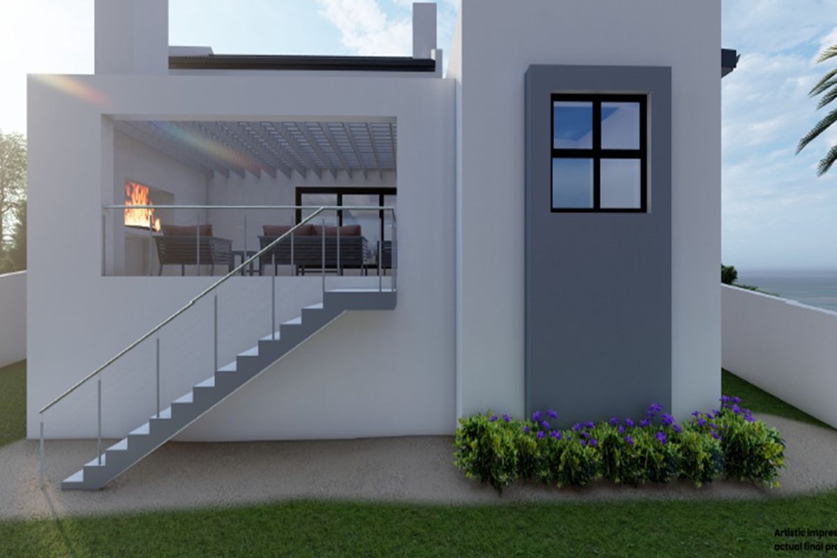 A modern rear exterior view featuring a covered patio with a built-in fireplace, accessible via an external staircase with a sleek balustrade.