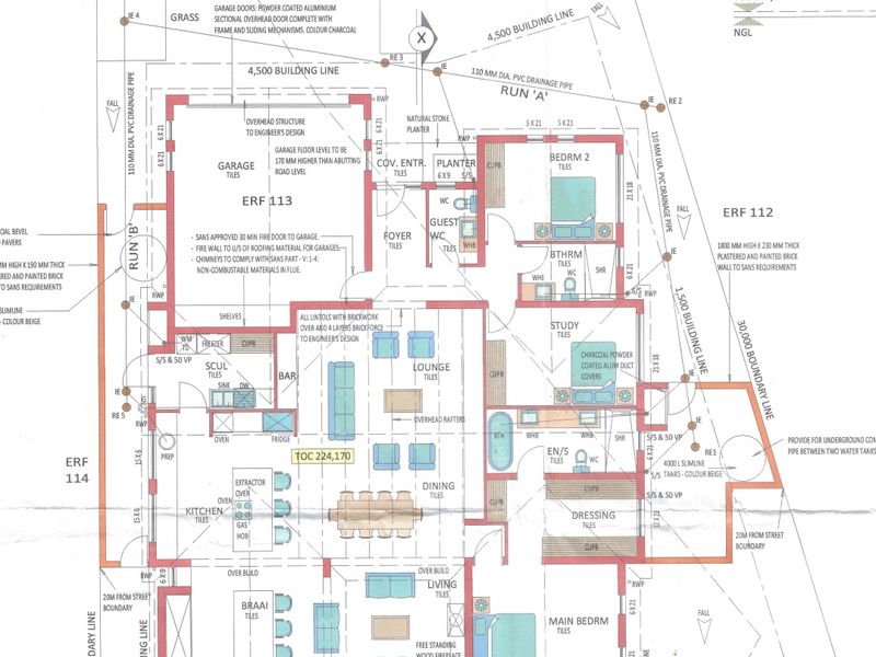 A detailed architectural floor plan showing the layout of the house, including kitchen, living areas, bedrooms, bathrooms, and garage.