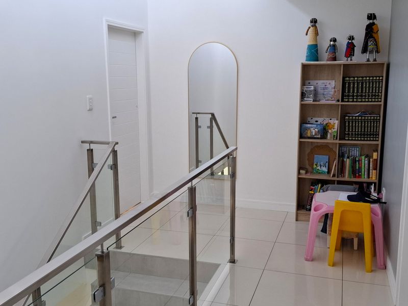 Tucked away in a secure estate, this modern duplex townhouse has room for the whole family. - Photo 8