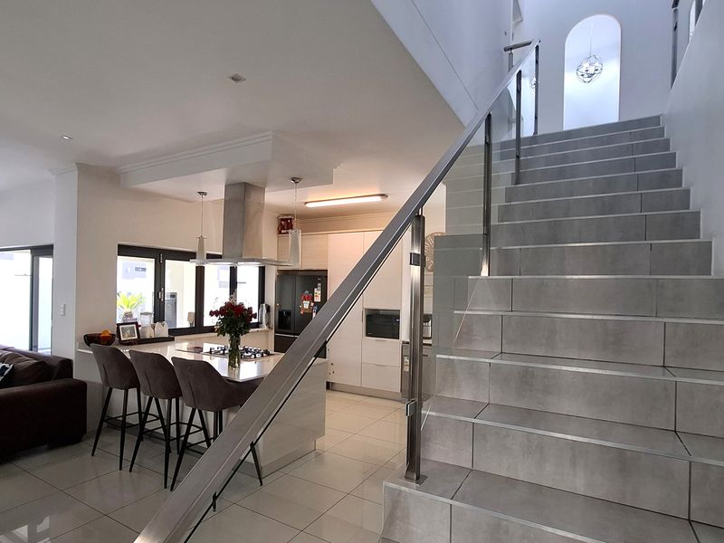 Tucked away in a secure estate, this modern duplex townhouse has room for the whole family. - Photo 7