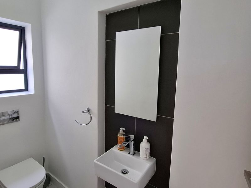 Tucked away in a secure estate, this modern duplex townhouse has room for the whole family. - Photo 6