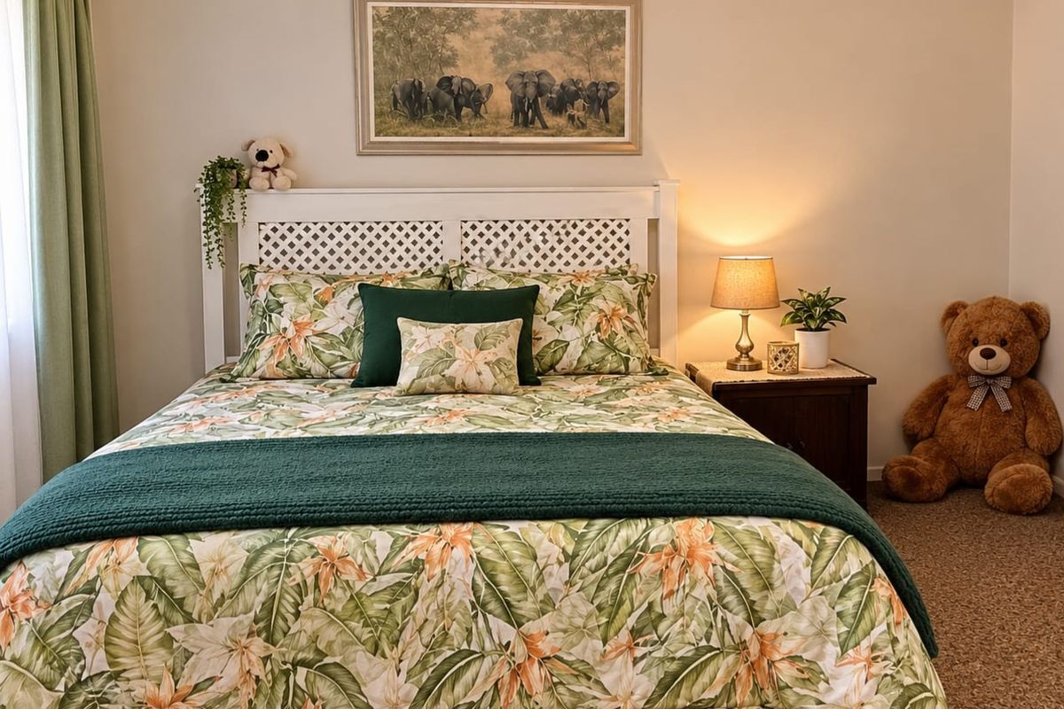 A well-maintained bedroom featuring neutral wall tones, carpeted flooring, and decorative coving, providing a comfortable and inviting sleeping space.