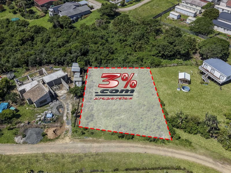 An aerial view of a vacant residential plot of land, highlighting the property boundaries within a established neighborhood setting.